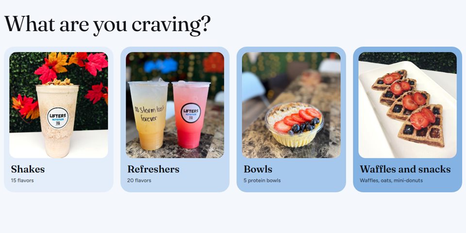 'What are you craving?' section with photo cards for shakes, refreshers, bowls, and waffles and snacks.